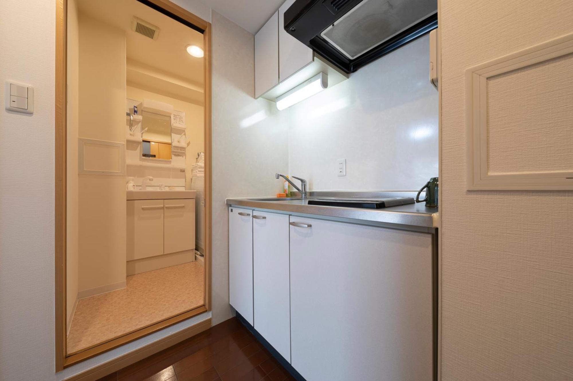 クリスタルコート難波 Apartamento Osaca Exterior foto